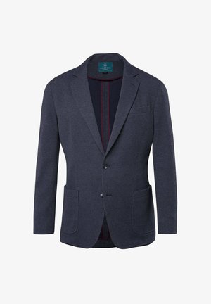 Blazer en velours bleu marine avec revers cranté, deux poches avant et une poche poitrine. L'intérieur est doté d'une doublure sombre avec un accent bordeaux.