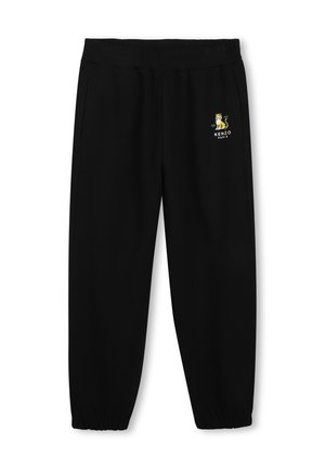 Pantalon de survêtement noir avec taille et poignets élastiqués, avec un petit tigre jaune et le logo Kenzo Paris sur la cuisse gauche.