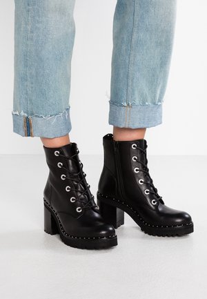 Bottines à plateau - black