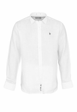 Witte lange mouwen button-up overhemd met kraag, klein geborduurd logo op de borst en tekst "US Polo Assn." vlakbij de onderkant vooraan.