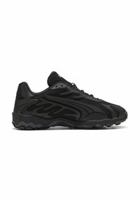 Sorte atletiske sneakers med en tekstureret mesh-overdel, bølgeformede designelementer og en gummisål med markante mønstre for godt greb.
