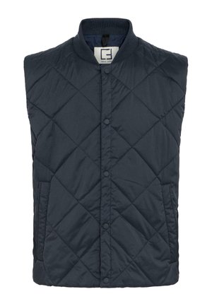 Ciemnoniebieska, pikowana kamizelka z diamentowym wzorem, zatrzaskami, prążkowanym kołnierzem oraz bocznymi kieszeniami. Wykonana z lekkiego, syntetycznego materiału.