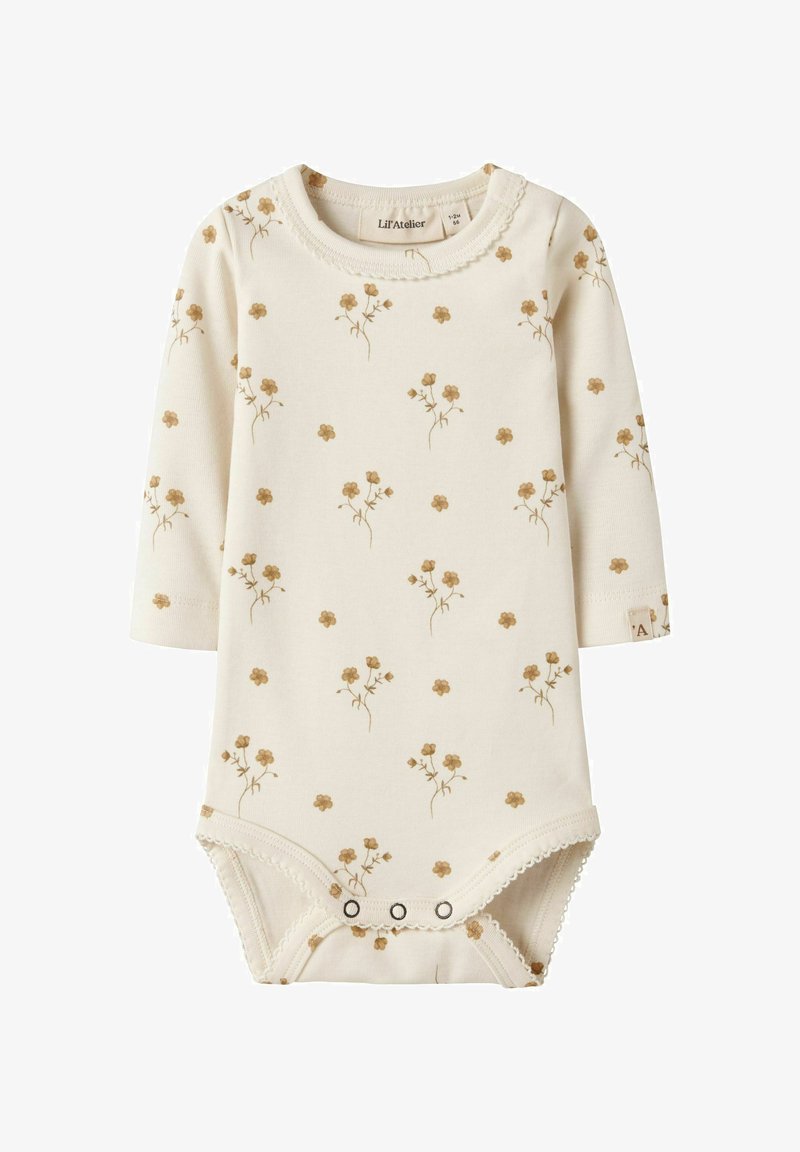 Body bébé à manches longues crème avec petit imprimé floral marron, col rond et fermetures à pressions en bas pour un change facile.
