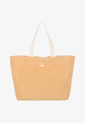 Sac cabas beige texturé avec des poignées blanches et un motif répétitif subtil présentant un petit logo centré à l'avant.
