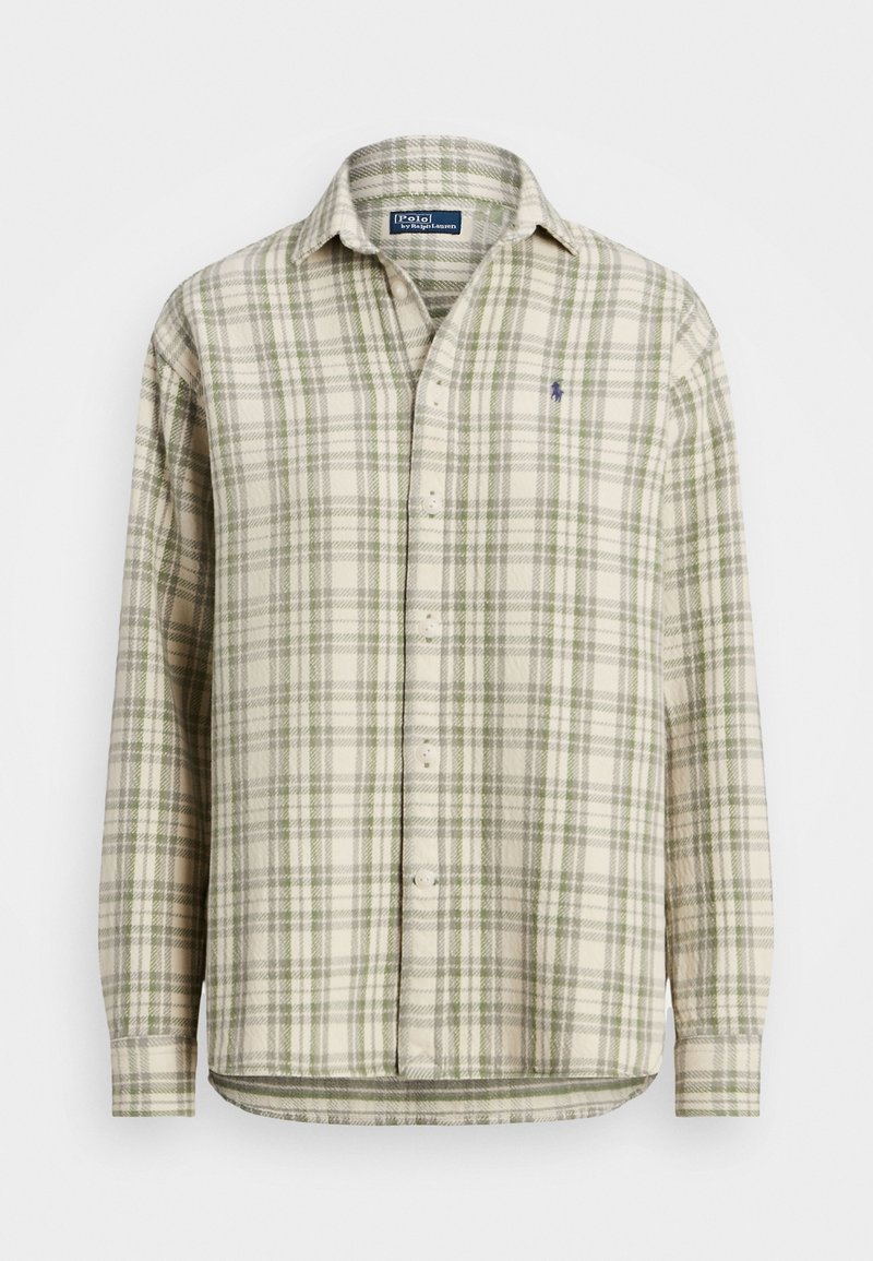 Chemise boutonnée à motif carreaux crème et vert. Fabriquée en tissu doux, elle dispose d'un col, de manches longues et d'un petit logo en accent.