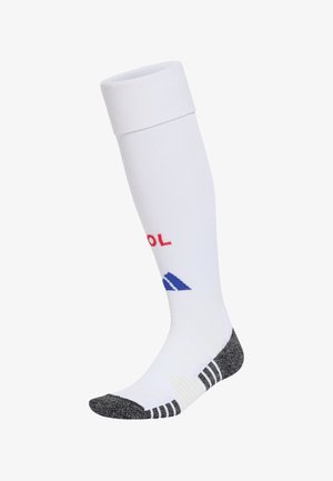 Calcetín deportivo blanco hasta la rodilla con puntera y talón reforzados en negro, con texto e logos impresos en rojo y azul en la pantorrilla.