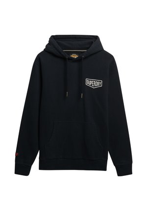 Black cotton hoodie with a front pocket, adjustable drawstring hood, and a white "SUPERDRY" logo patch on the chest.