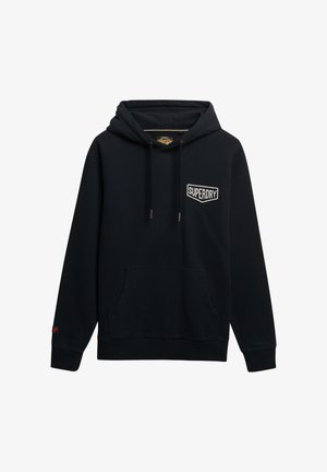 Black cotton hoodie with a front pocket, adjustable drawstring hood, and a white "SUPERDRY" logo patch on the chest.