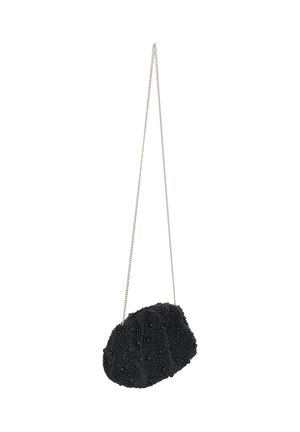 Black beaded evening clutch with a long thin silver chain strap hanging against a white background.