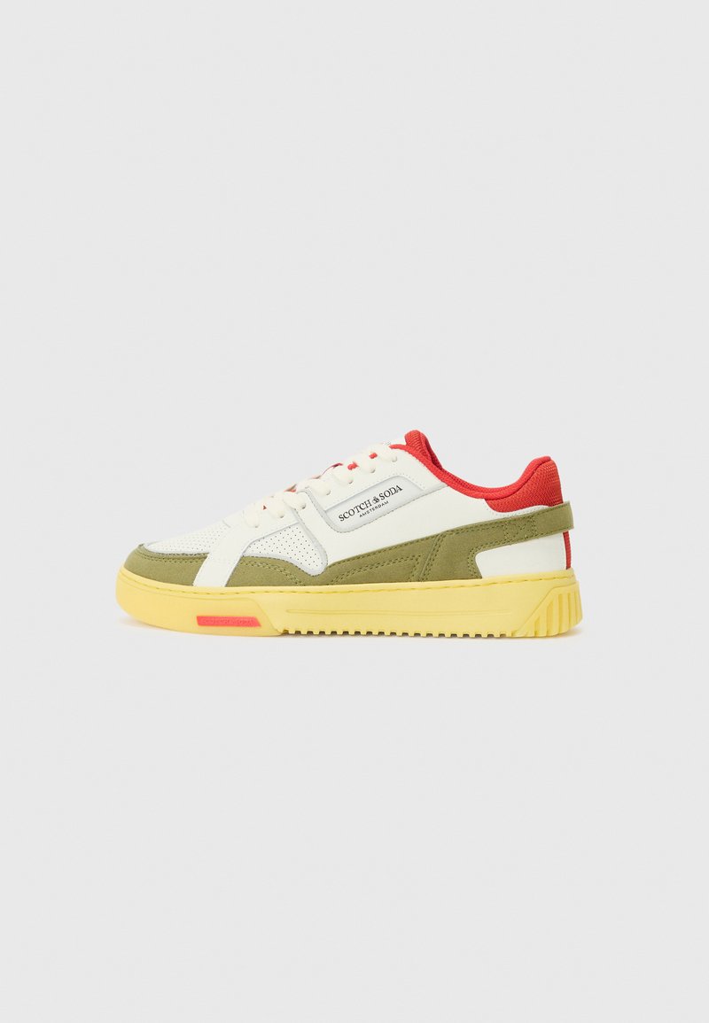 Sneakers with a green and white upper, red accents, and a yellow sole. Features a mixed material design with prominent stitching and branding.