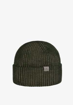 Dark green ribbed knit beanie with folded cuff and small rectangular fabric tag on the front.