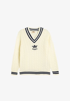 Cremfarbener Cable-Knit-Pullover mit V-Ausschnitt, navy gestreiftem Kragen und aufgesticktem Kronsymbol mit "SPORT" in Navy. Weicher Stoff.