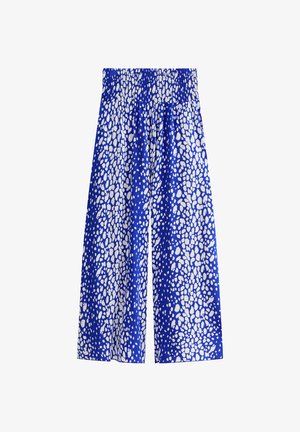Wide-leg pants with blue and white irregular spot pattern and a high, gathered elastic waistband.