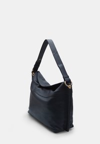 Black leather shoulder bag with a soft, structured shape. Features a curved top, adjustable strap, and gold hardware accents.