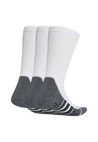 Tres pares de calcetines con una parte superior de canalé blanca y un pie en degradado gris. La zona gris tiene acentos de agarre negros en la suela.