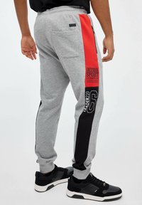 INSIDE JOGGER LEADER - Pantalones deportivos - gris