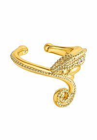 Pulsera de acero en tono dorado con forma de serpiente, con escamas texturizadas y acentos de cristal, presentando un extremo en espiral y un diseño curvado. Ajuste ajustable.