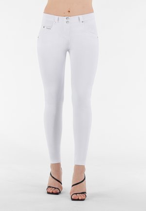 IN NAVETTA TINTO IN CAPO - Jeggings - bianco