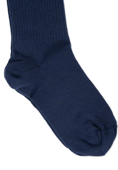 Calza a coste di colore blu navy realizzata in materiale morbido, con punta rinforzata e texture liscia, progettata per comfort e durata.