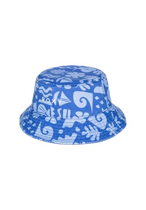 Chapeau seau bleu en tissu présentant un motif floral et des vagues bleu clair. Couronne arrondie avec un large rebord flexible.