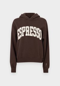 Sudadera con capucha marrón con un bolsillo frontal tipo canguro, que presenta un gráfico sobredimensionado de "ESPRESSO" en color crema claro. Tejido suave y ajuste relajado.