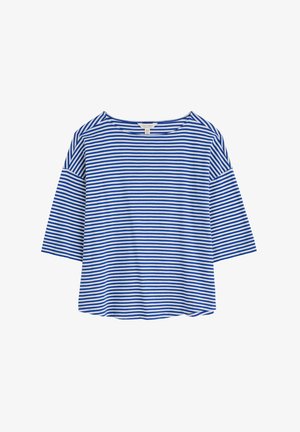 Mėlynai ir baltai dryžuota marškinė su plačiu apvaliu iškirpimu, trijų ketvirčių ilgio rankovėmis ir laisvu siluetu. Minkšta medvilnės medžiaga.