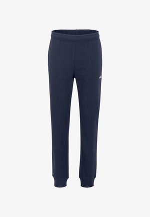 Navy blauwe joggingbroek van zacht materiaal. Heeft een elastische tailleband, taps toelopende benen en een klein wit logo aan de zijkant.