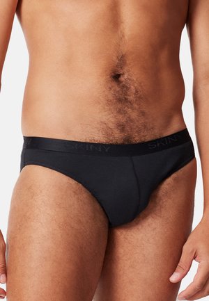 Schwarze Baumwollunterhose mit elastischem Bündchen und „SKINY“-Logo. Glatte Textur und körpernahe Passform, geeignet für den täglichen Gebrauch.