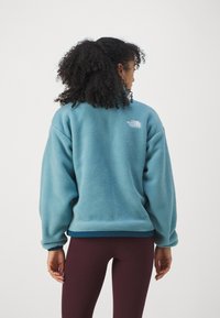 The North Face YUMIORI REVERSIBLE JACKET - Jakna od flisa - midnight petrol/algae blue