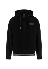 Felpa nera con zip, caratterizzata da un logo grigio, strisce laterali a contrasto e polsini e orlo a costine. Realizzata in tessuto morbido con una vestibilità comoda.