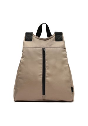 Beige nylon backpack with a triangular shape, front zipper pocket, and black accents on the straps and top handle. Smooth texture.