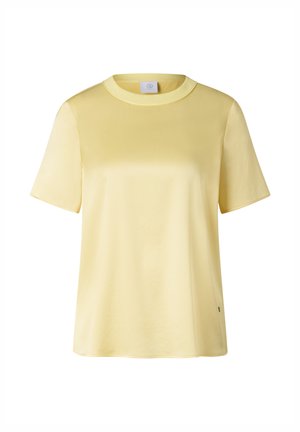 Lysegul kortærmet t-shirt med rund hals og en blød, glat tekstur, vist på en ensfarvet hvid baggrund.