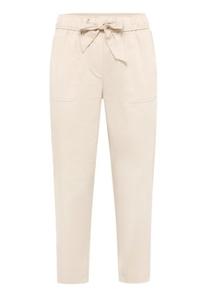 Beige konisch zulaufende Hose mit elastischem Bund und vorderer Schnürung, mit großen aufgesetzten Taschen vorne und Seitennähten.