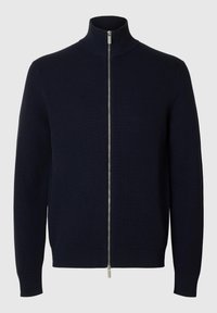 Maglione blu navy con zip, dotato di un colletto alto, caratterizzato da una texture a coste e maniche a costina, realizzato in morbido materiale knit. Dettagli con zip argentata.