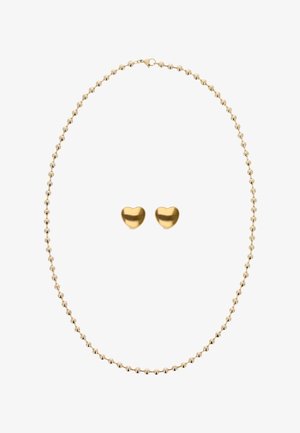 Ensemble de bijoux couleur or comprenant un collier à perles et des boucles d'oreilles en forme de cœur, tous avec une finition lisse et brillante.