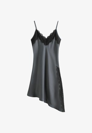 Black silky slip dress with thin straps, lace trim on neckline and side, and asymmetrical hemline.