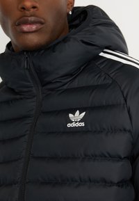 adidas Originals PAD HOODED  - Ziemas jaka - black/white