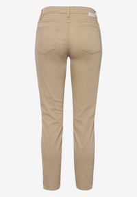 Beige slim-fit trousers with a smooth texture, featuring two back pockets and a belt loop at the waist. Clean design with no embellishments.