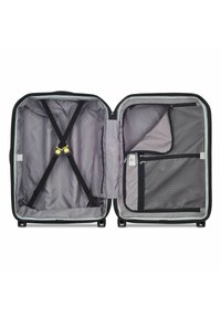 Valigia nera con ruote, dotata di interno grigio, con cinghie incrociate, più tasche e un compartimento in rete con zip. Chiusura con zip.