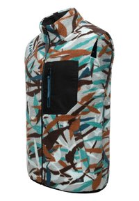 Fleece prsluk s mnoštvom apstraktnih uzoraka u tirkiznoj, smeđoj i bijeloj boji; sadrži crnu zipersku džep na prsima i visoki ovratnik.