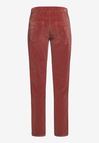 Pantalon en velours côtelé couleur rouille avec jambes droites, taille élastique et deux poches plaquées à l'arrière.