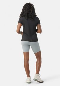 Smartwool SMARTWOOL CARVED LOGO GRAPHIC SHORT SLEEVE - T-shirt med print - black