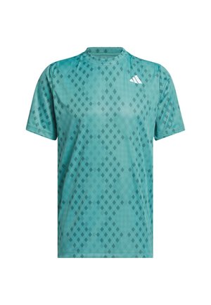 Maglietta sportiva color teal realizzata in tessuto traspirante con un motivo a diamante; collo giro; maniche corte; logo a contrasto sul petto.