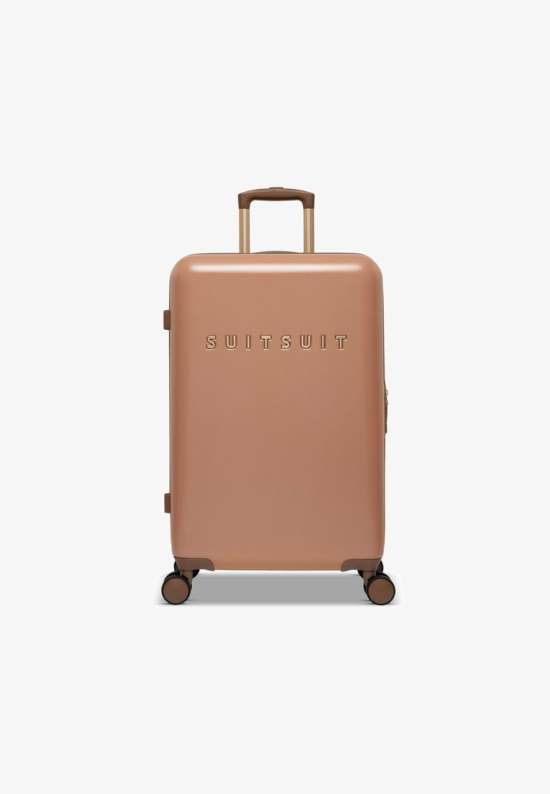 Harde handbagagekoffer in roségoud, met een matte afwerking, gegraveerde merknaam, een uitschuifbare handgreep en vier wielen voor mobiliteit.