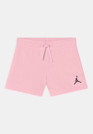 Shorts de sport roses avec taille à cordon et logo Jumpman noir sur la partie inférieure de la jambe gauche.