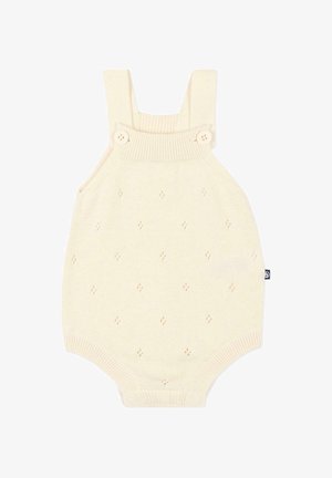 Tutina per neonati color crema lavorata a maglia con bretelle fissate da bottoni e piccoli motivi a rombo lavorati su tutta la superficie.