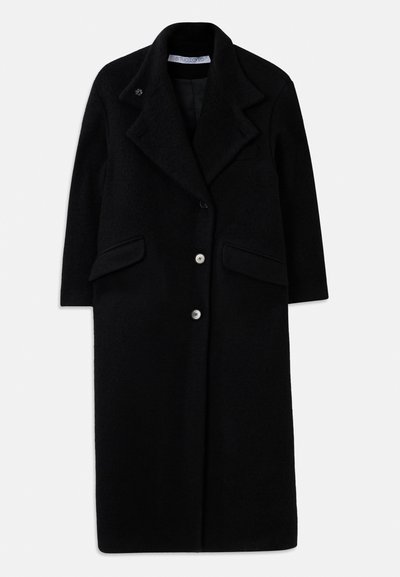 Garšs melns vilnas mētelis ar platām atlokām, trim priekšējām pogām, divām kabatām ar atloku un garām piedurknēm.