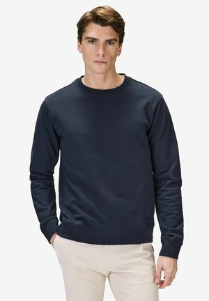Marineblå sweatshirt fremstillet af bomuldsblanding med rund halsudskæring, lange ærmer og ribstrikkede cuffs. Glat tekstur uden synlige mønstre.