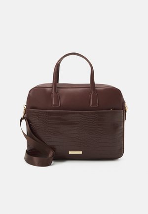Brown leather briefcase with textured front pocket, dual handles, and detachable shoulder strap on white background.