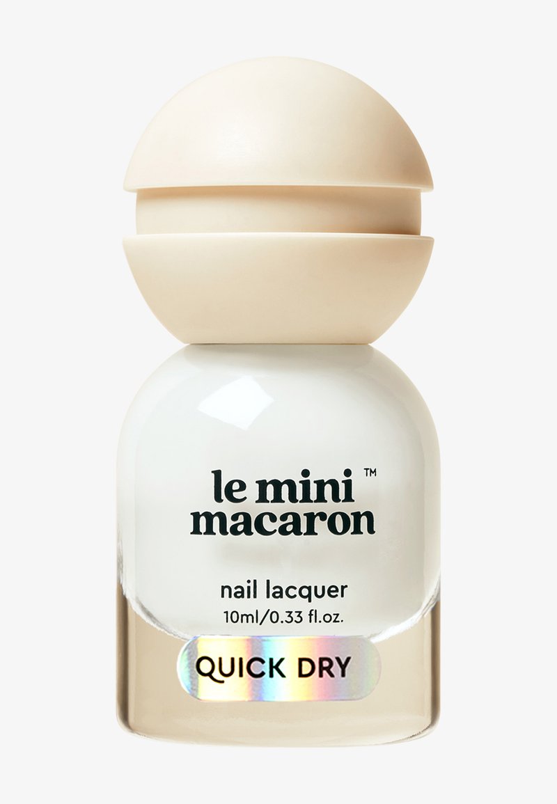 Le Mini Macaron snel drogende nagellakfles, 10 ml, met een ronde beige dop en witte lak erin.